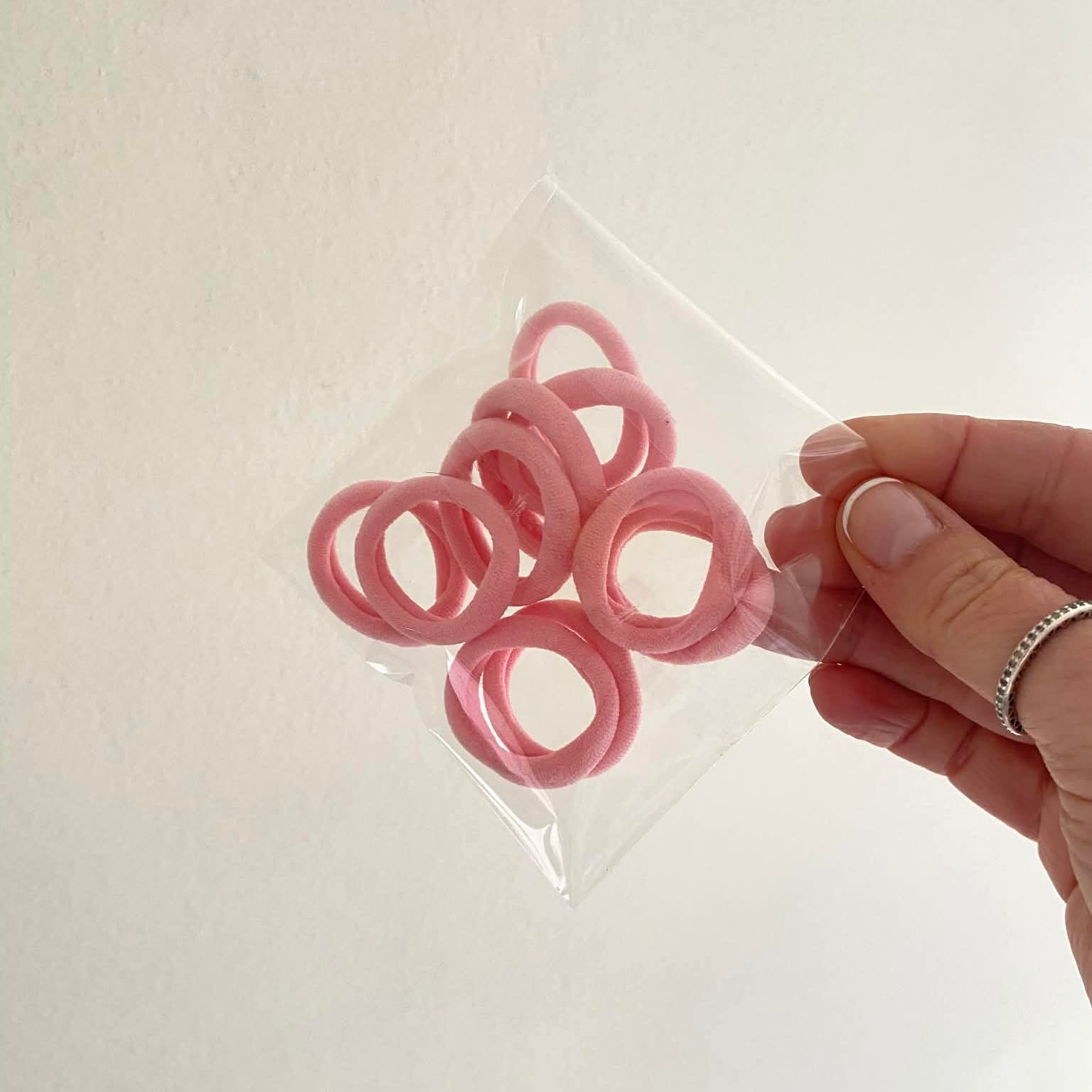 Pink nylon bobbles x 10 | Standard size