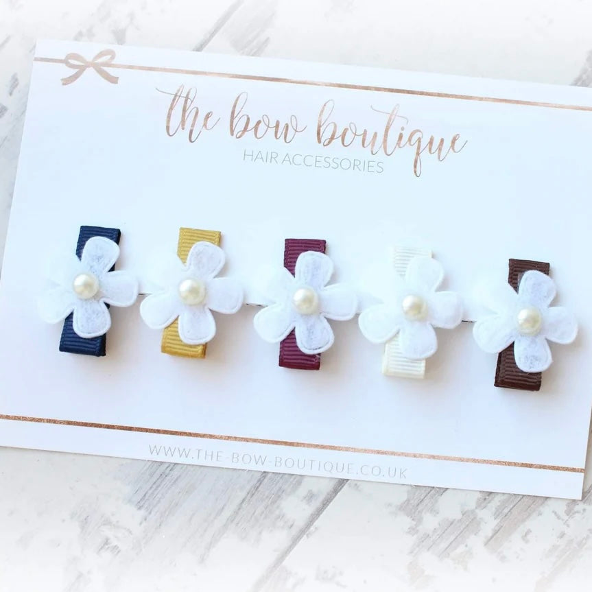 My first neutral daisy clip set