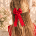 Large red tail pinch ribbon bows