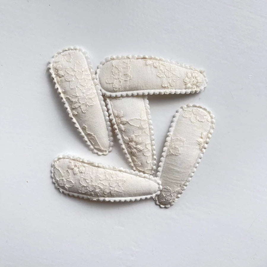 Embroidered snappy clips