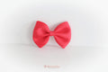 Large red pinch bows