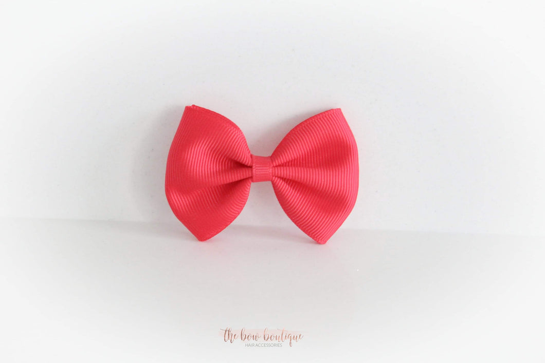 Large red pinch bows