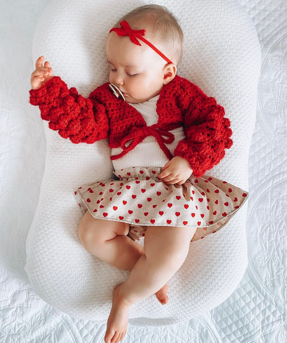 Tied ruffle red bows