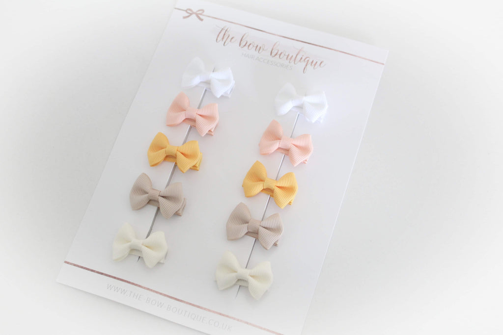 My first sunset mini pinch bows | clips or bobbles