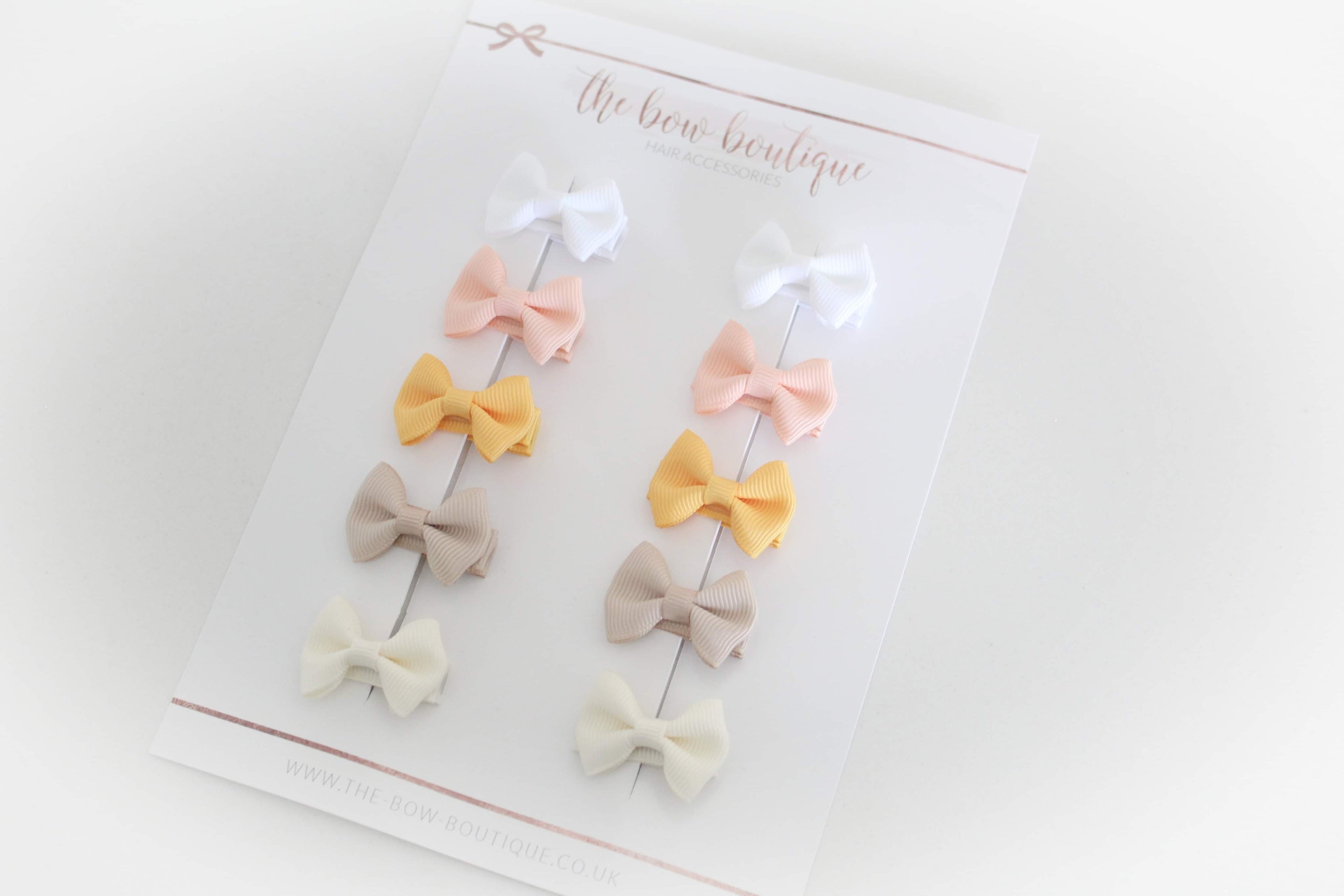 My first sunset mini pinch bows | clips or bobbles