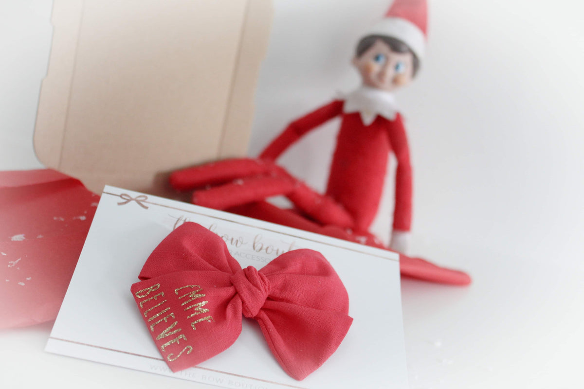 Christmas believe glitter bow | Clip, headband or bobble