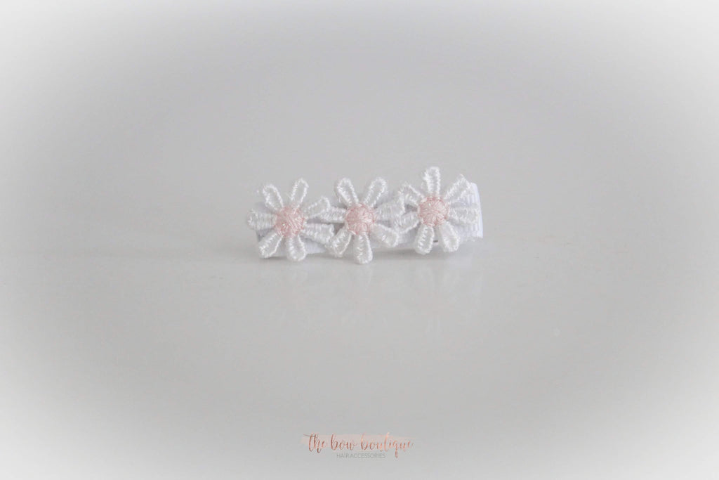 Delicate pink daisy flowers | Clip or headband