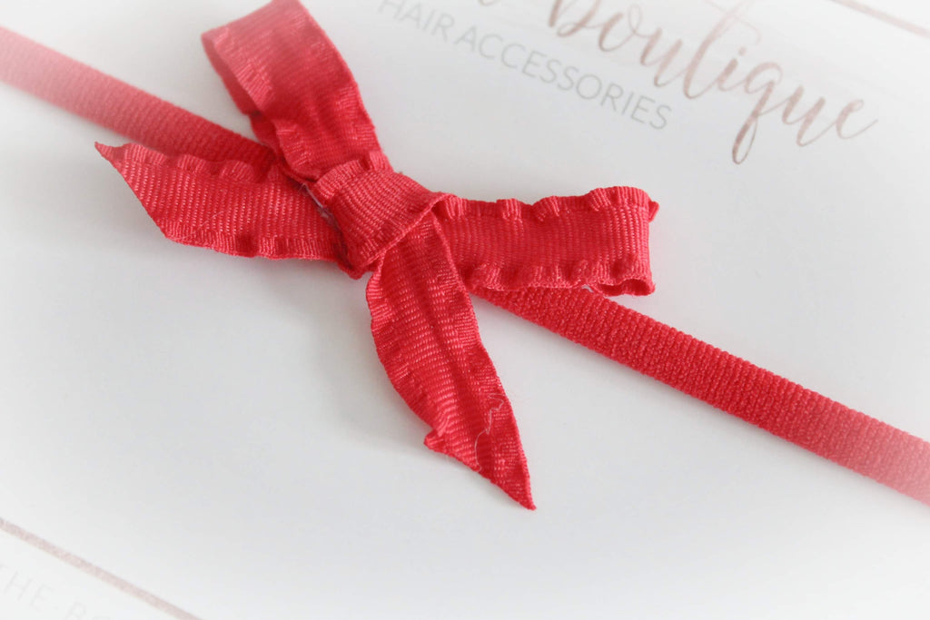 Hand tied ruffle red bows | Clip or headband