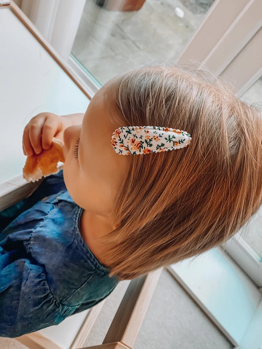 Embroidered snappy clips