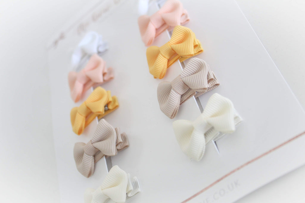 My first sunset mini pinch bows | clips or bobbles