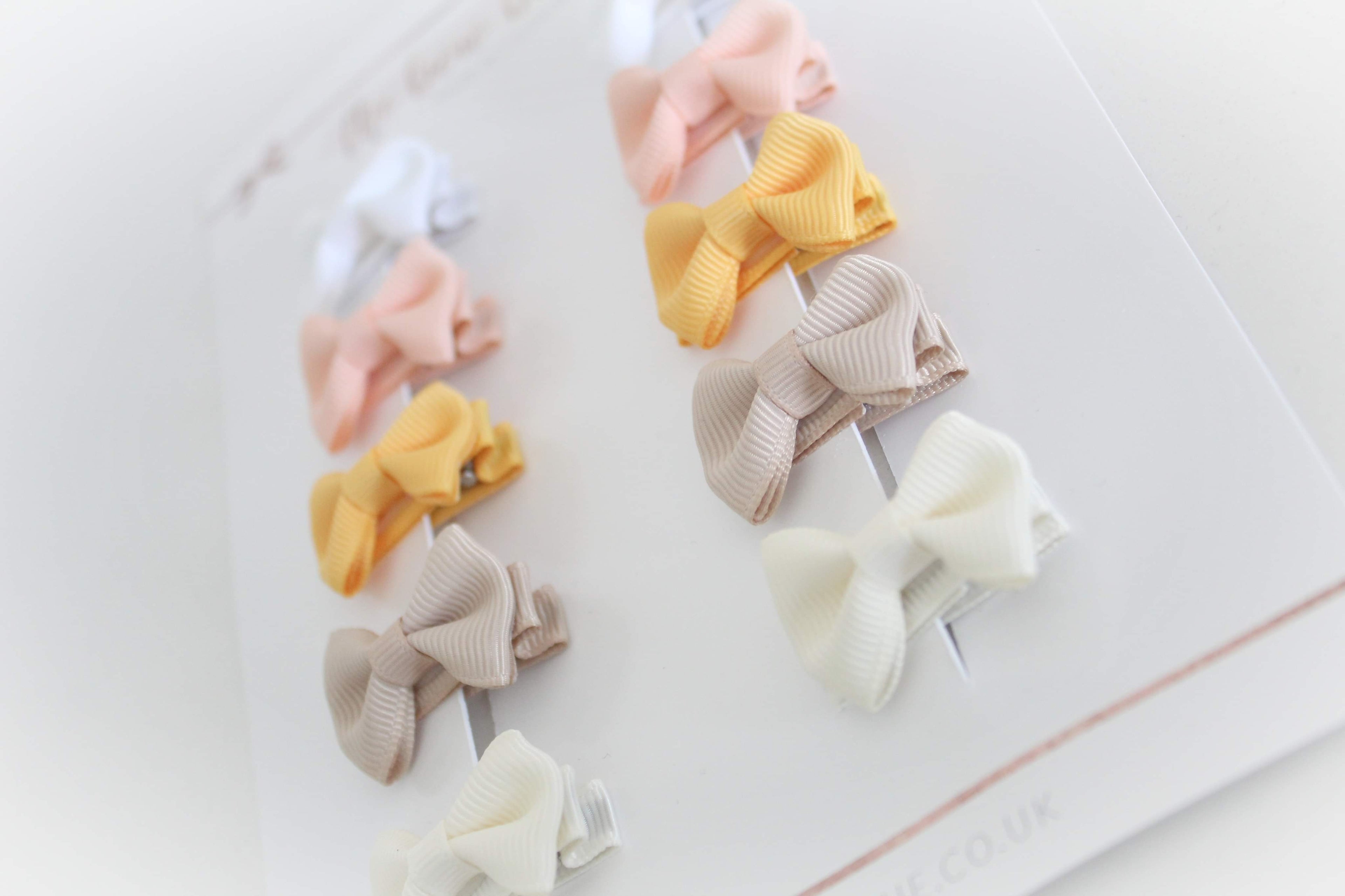 My first sunset mini pinch bows | clips or bobbles