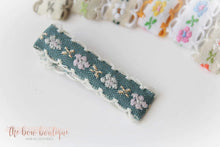 Load image into Gallery viewer, Embroidered floral lined clip (9 colours I 2 sizes )