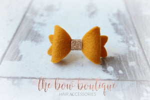 Mini baby felt gold centre bows ( 25 Colours )