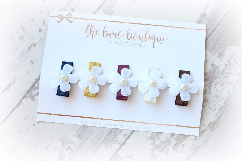 My first neutral daisy clip set