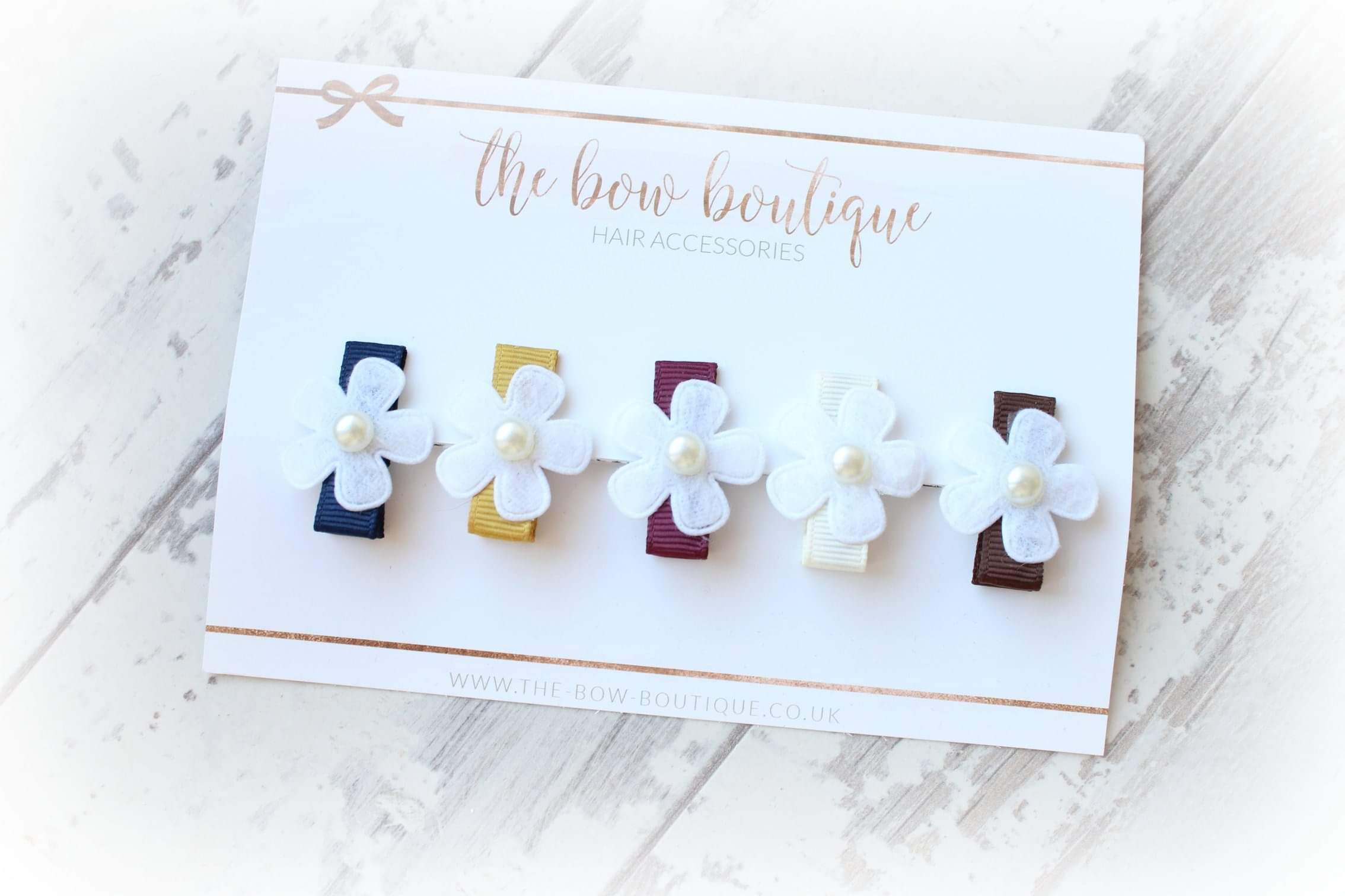 My first neutral daisy clip set