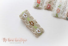 Load image into Gallery viewer, Embroidered floral lined clip (9 colours I 2 sizes )